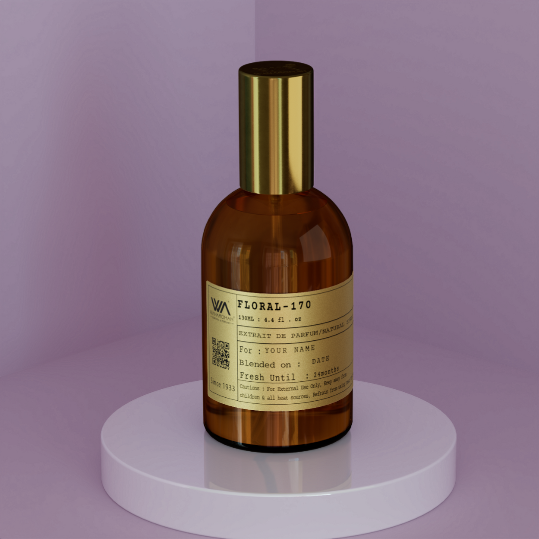 A bottle of perfume labeled 'FLORAL-170' with a brown tint and a gold-colored cap, displayed on a white surface against a purple background.